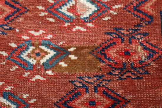 A Tekke style red ground rug 164 x 130cm